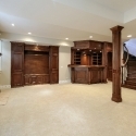 Basement with wood cabinetry