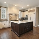 Kitchen with wood and granite island